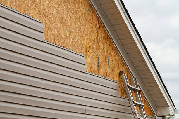 Professional Emergency Siding Repair technician working in Evans City, PA